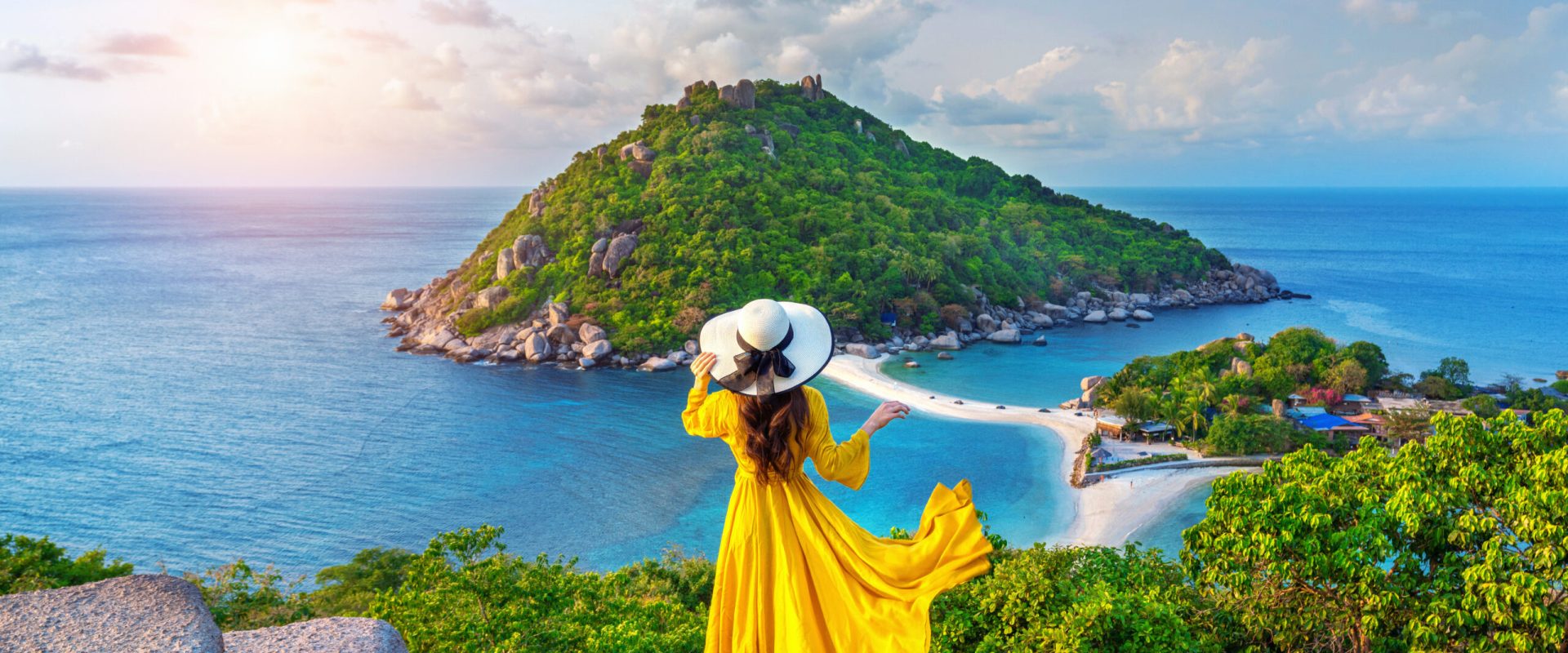 Beautiful girl standing on viewpoint at Koh Nangyuan island near Koh Tao island, Surat Thani in Thailand.